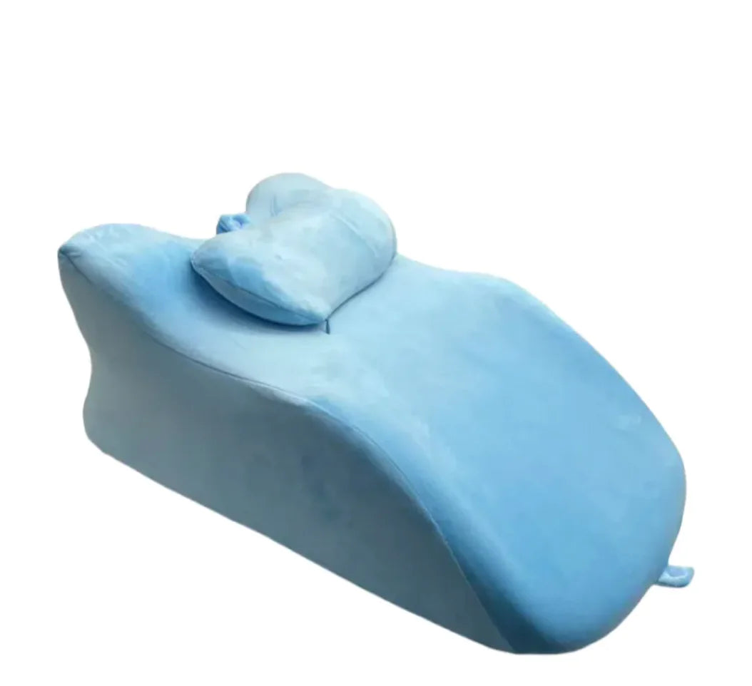 “Ergonomic prone‑position comfort pillow with contoured support and removable headrest, designed for stomach sleeping and face‑down relaxation.”