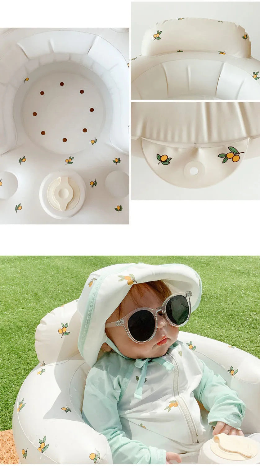 “Inflatable baby chair with supportive backrest and center post, featuring pink bunny pattern, designed for safe seating during dining or bath time.”