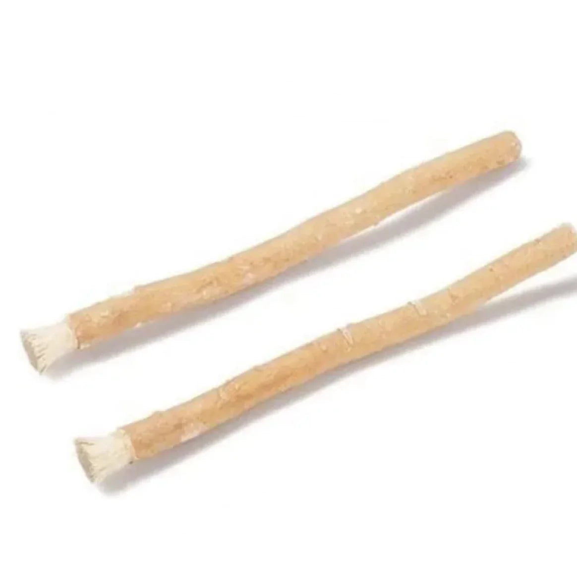 “Natural miswak tooth‑cleaning stick used for traditional oral hygiene, thin 15cm wood branch with frayed brushing tip.”