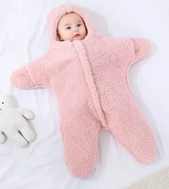 “Soft star‑shaped baby quilt with hooded, cozy fleece design, gentle on baby’s skin and perfect for nursery or crib use.”