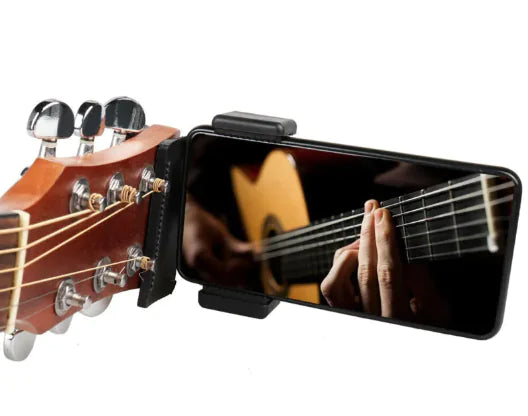 “Adjustable phone clip stand mounted on a guitar headstock, providing a secure hands‑free setup for recording, streaming, and practice.”