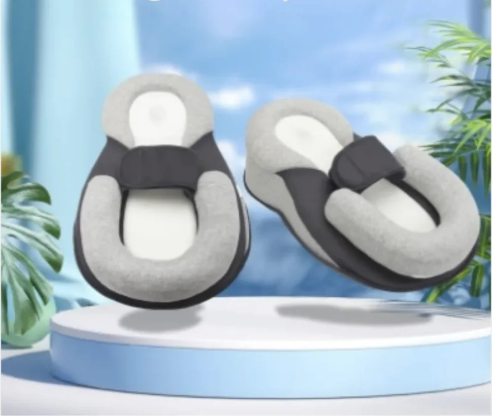 “Adjustable baby anti‑spit‑up pillow with memory‑foam support and repositionable cushion, designed with a gentle incline to aid digestion and comfort.”