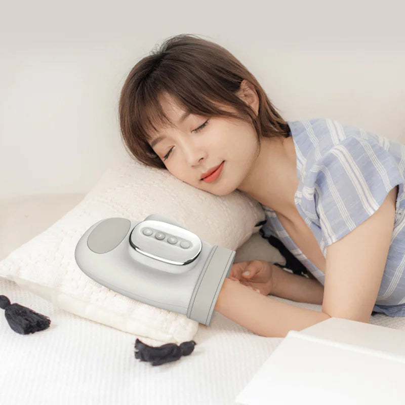 “Wireless hand and wrist massager with ergonomic design, multiple massage modes, and 15‑minute automatic timing for daily relaxation.”