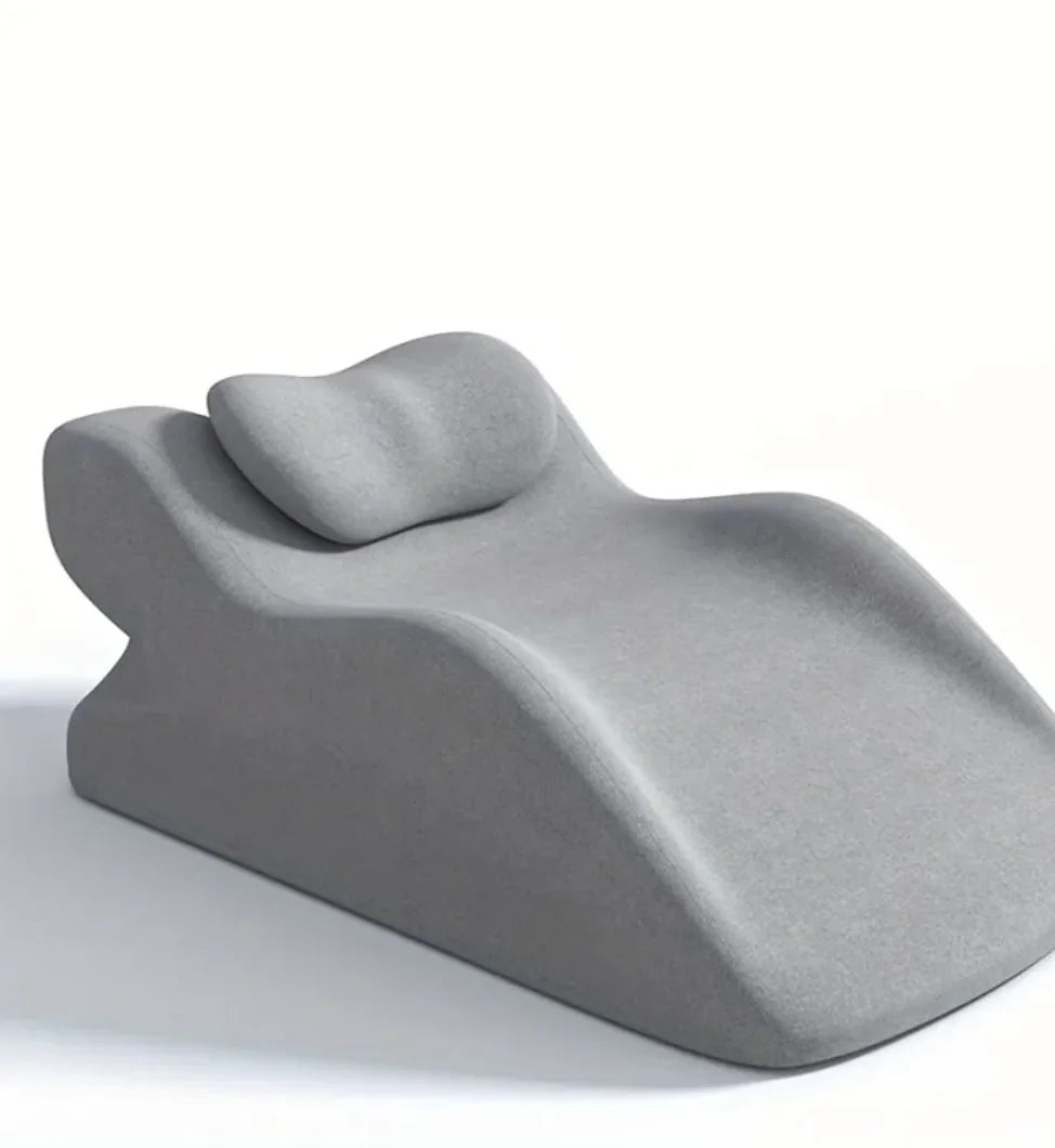 “Ergonomic prone‑position comfort pillow with contoured support and removable headrest, designed for stomach sleeping and face‑down relaxation.”