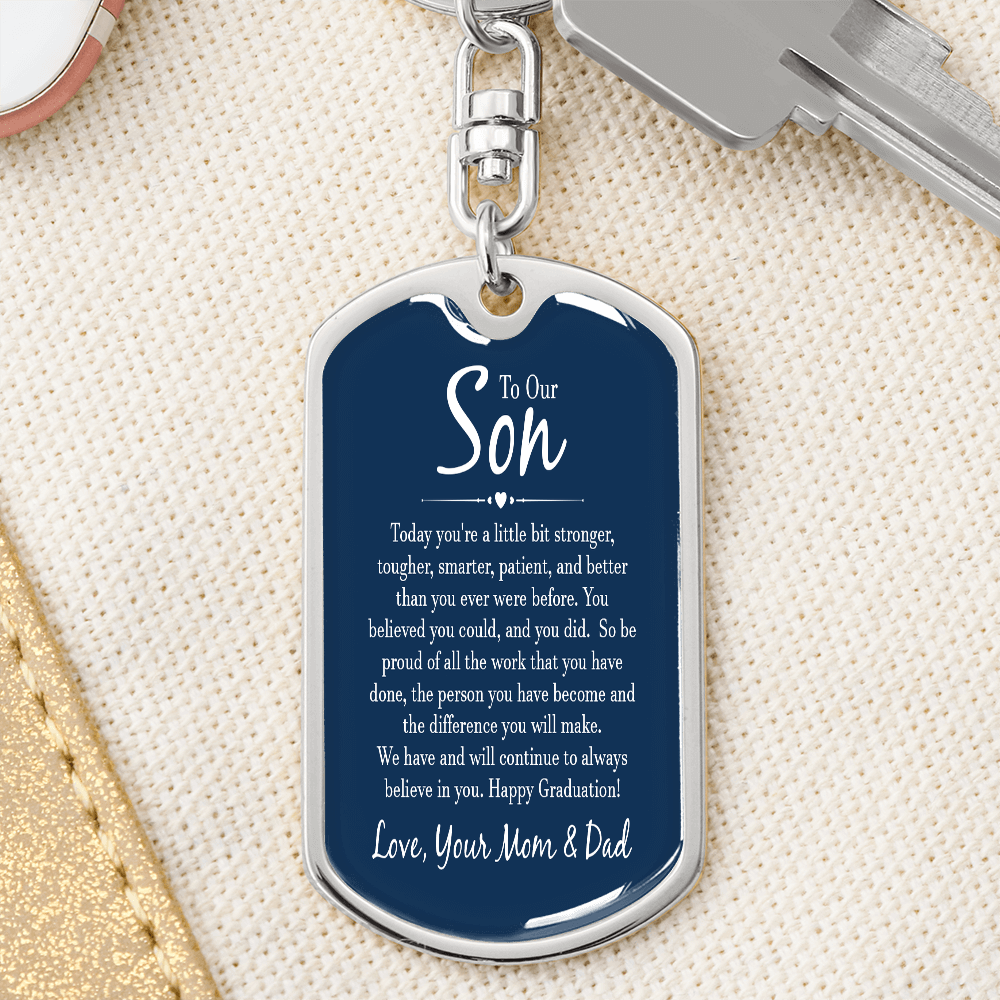 “Personalized dog tag keychain with custom photo on message card reading ‘To Our Son’ from Mom and Dad, displayed in gift box.”
