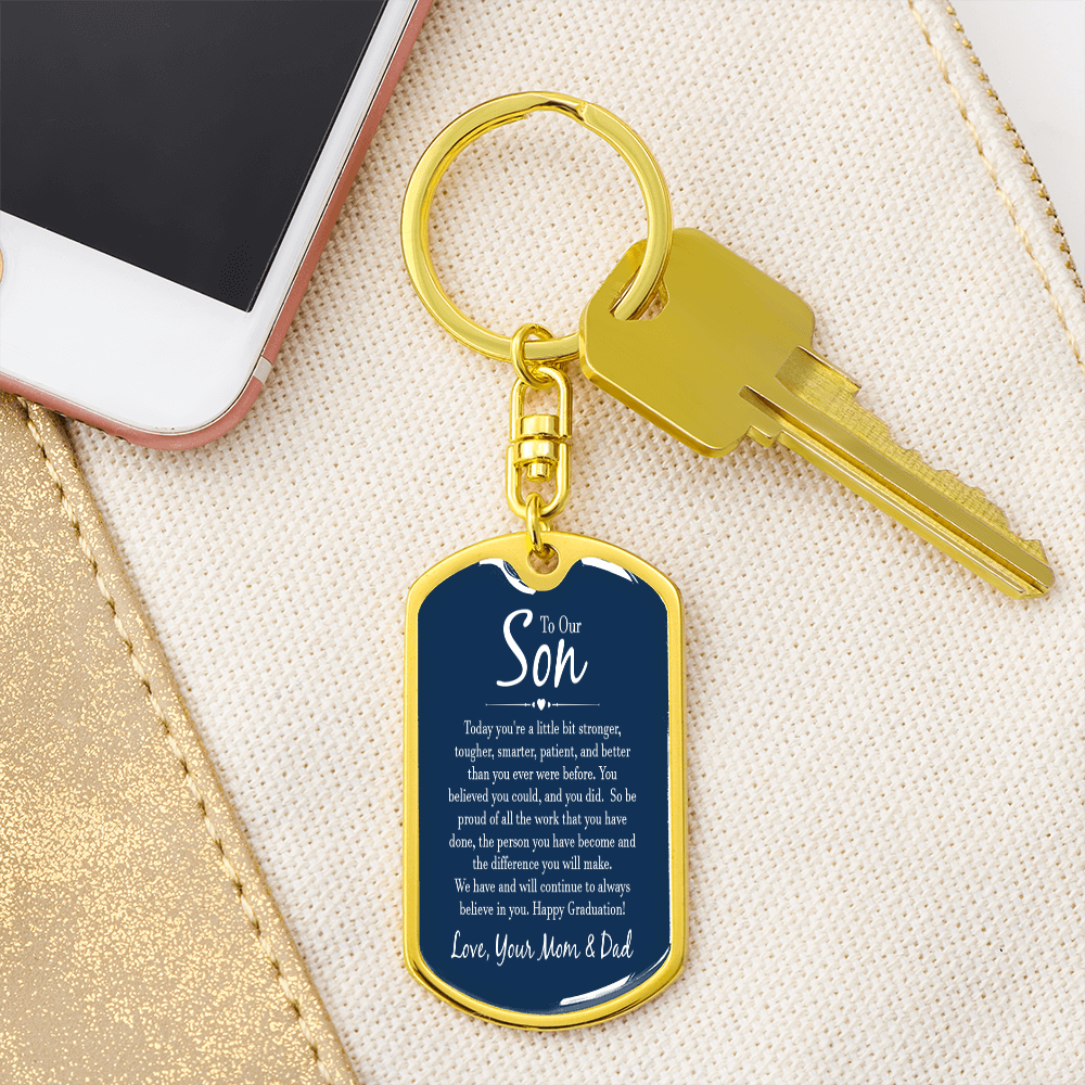 “Personalized dog tag keychain with custom photo on message card reading ‘To Our Son’ from Mom and Dad, displayed in gift box.”