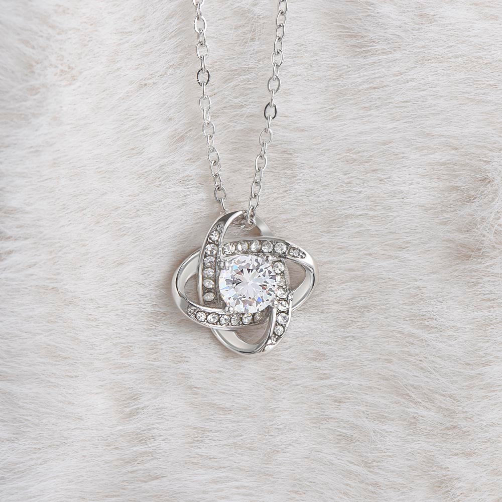 “Love Knot Necklace in gift box with romantic ‘To My Wife’ message from husband, featuring silver pendant with sparkling center stone.”