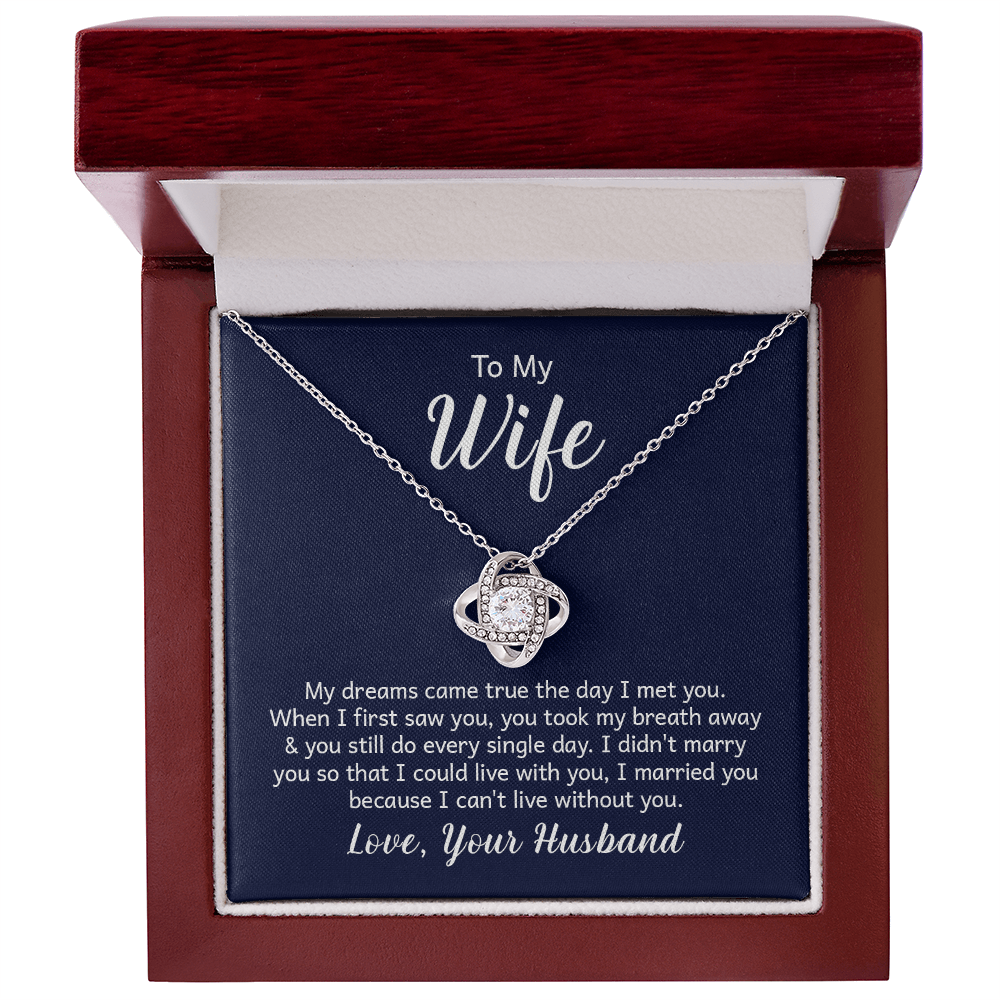 “Love Knot Necklace in gift box with romantic ‘To My Wife’ message from husband, featuring silver pendant with sparkling center stone.”