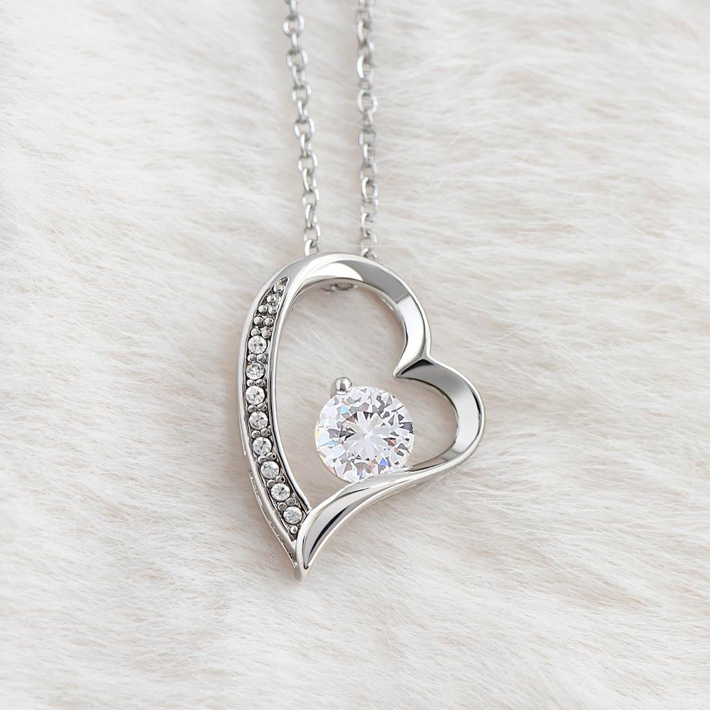 “Forever Love Necklace with heart‑shaped pendant and center stone displayed in gift box with ‘To My Daughter’ message card from Dad.”