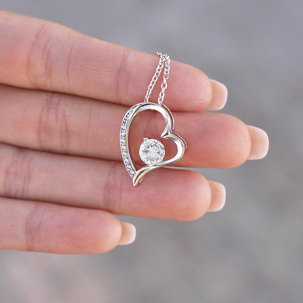 “Forever Love Necklace with heart‑shaped pendant and center stone displayed in gift box with ‘To My Daughter’ message card from Dad.”