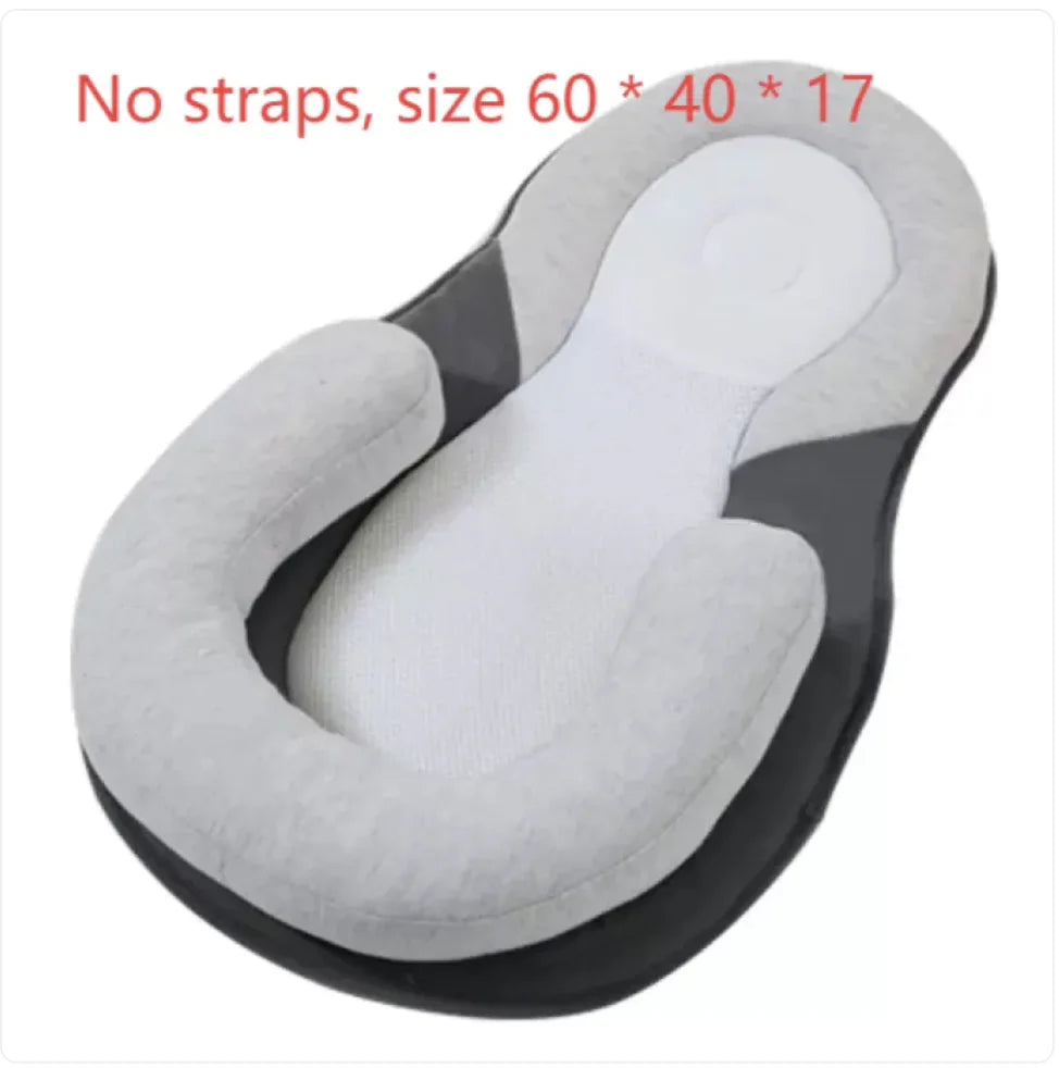 “Adjustable baby anti‑spit‑up pillow with memory‑foam support and repositionable cushion, designed with a gentle incline to aid digestion and comfort.”