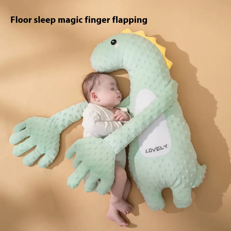 “Soft dinosaur‑shaped baby soothing pillow with plush PP‑cotton filling, designed to comfort infants ages 0–3 during rest or floor play.”