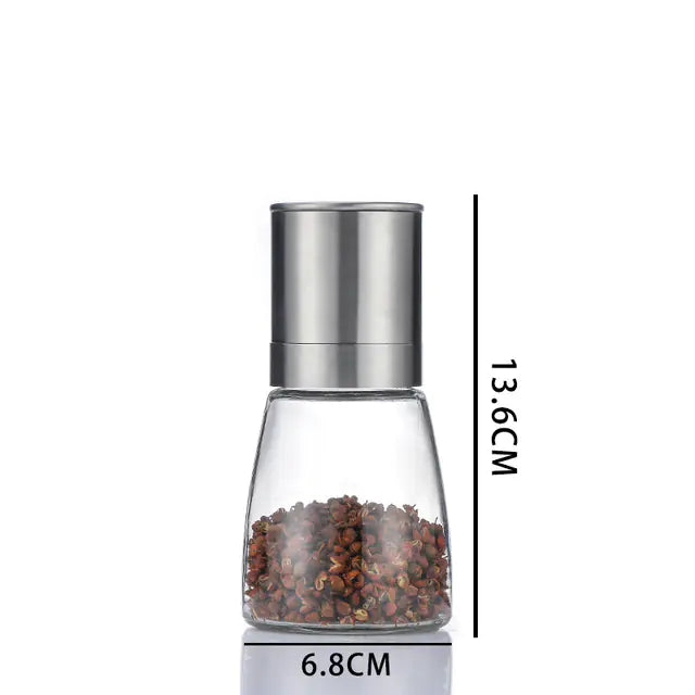“Stainless‑steel 2‑in‑1 pepper and spice grinder with clear center chamber and dual grinding heads, sleek cylindrical design.”