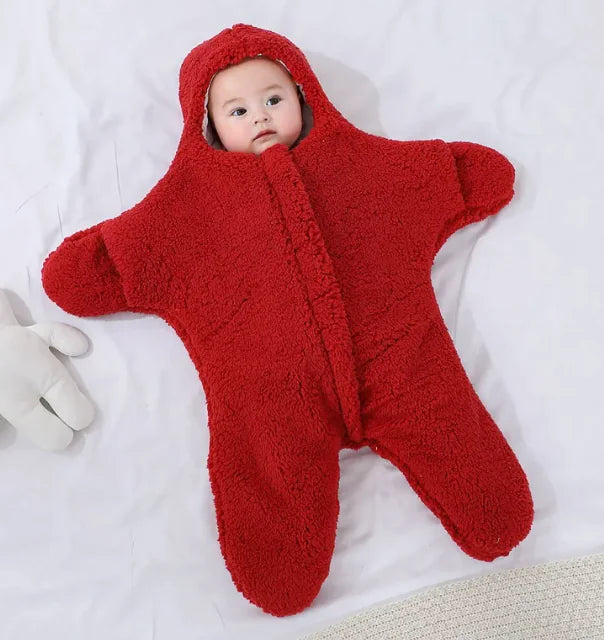 “Soft star‑shaped baby quilt with hooded, cozy fleece design, gentle on baby’s skin and perfect for nursery or crib use.”
