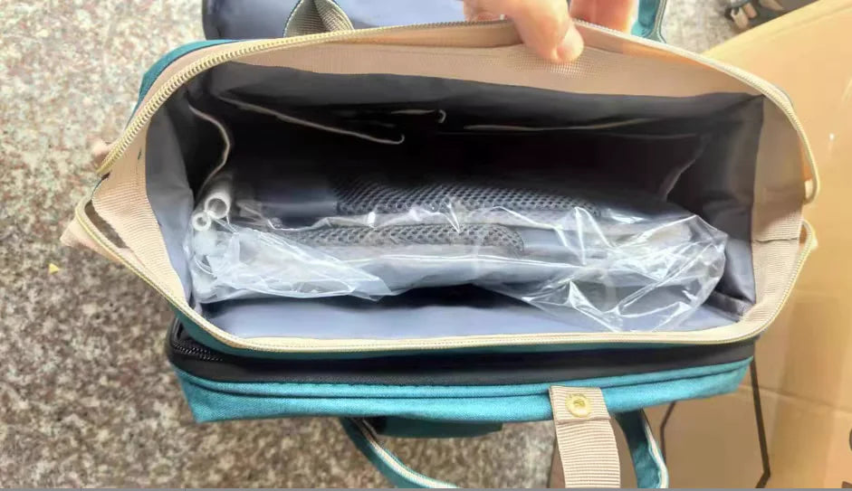 “Large‑capacity mommy backpack with front zipper pocket, dual top handles, and adjustable shoulder straps, designed for organized baby essentials and travel use.”